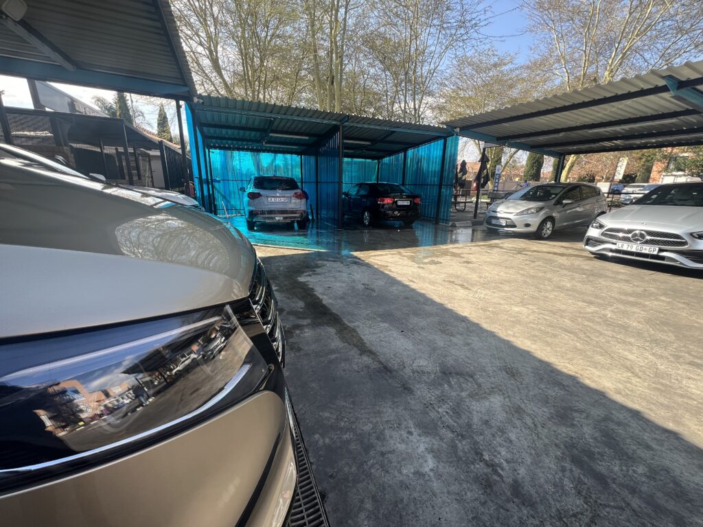 Cars Ready for Pickup After Premium Wash at Aqua Dazzle